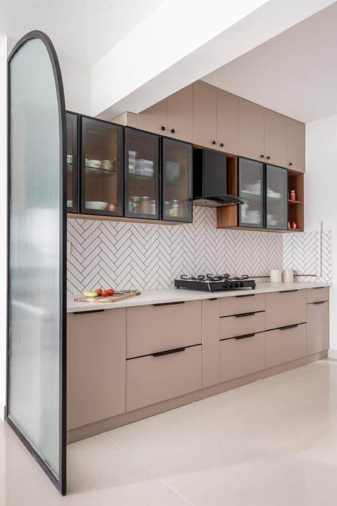 Modern white kitchen with brass fixtures